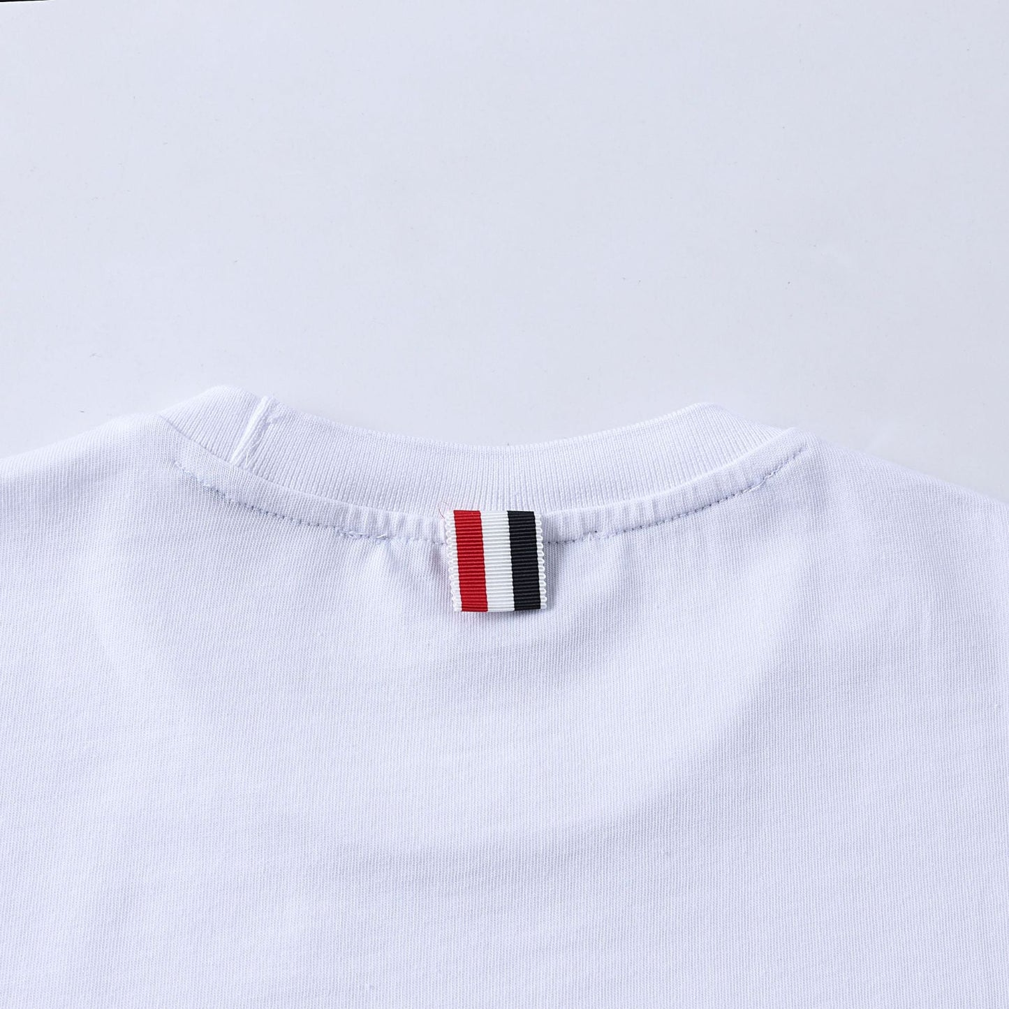 トム ブラウン 子犬の刺繍 Tシャツ