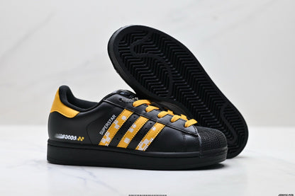 Adidas K81801450 Unisex Shell-Toe Sneakers - Black/Yellow - image 9